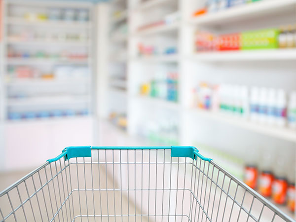 shallow focus photo of shopping cart in a retail store