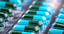 tray of blue-green medication capsules